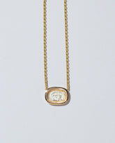  Arrow Intaglio Necklace on light color background.