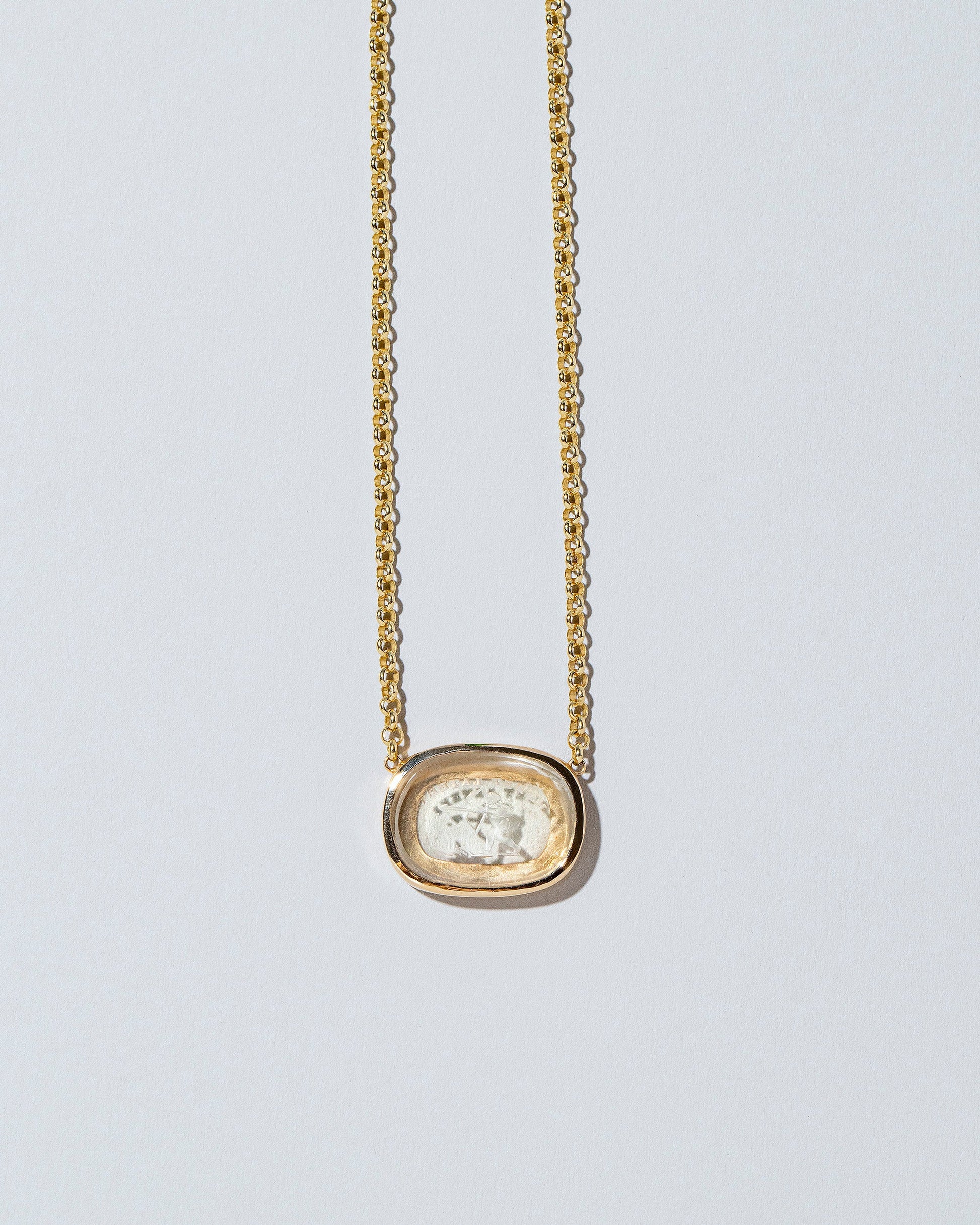  Arrow Intaglio Necklace on light color background.