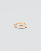 Gold Solid Square Wire Right Slump Band on light color background.