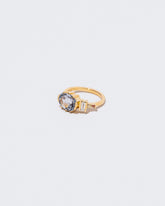 Side view of Heliotrope Ring on white background