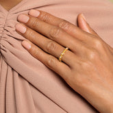 product_details::Yellow Sapphire Eleven Trillion Ring on model.