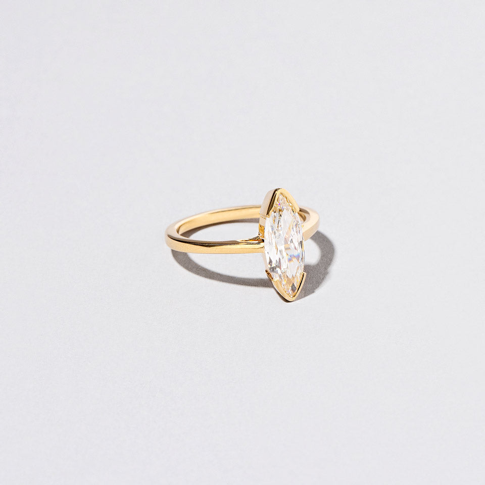product_details::Closeup details of the Parabola Ring on light color background.