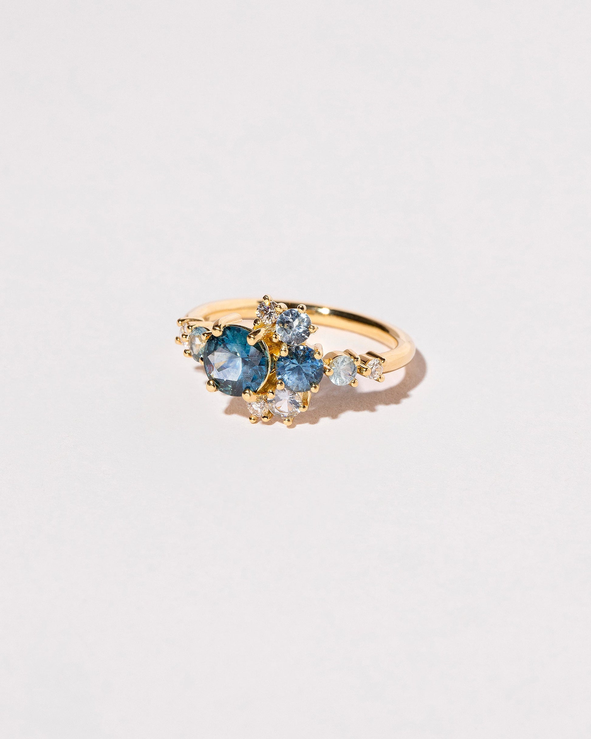  Montana Sapphire Crescent Ring on light color background.