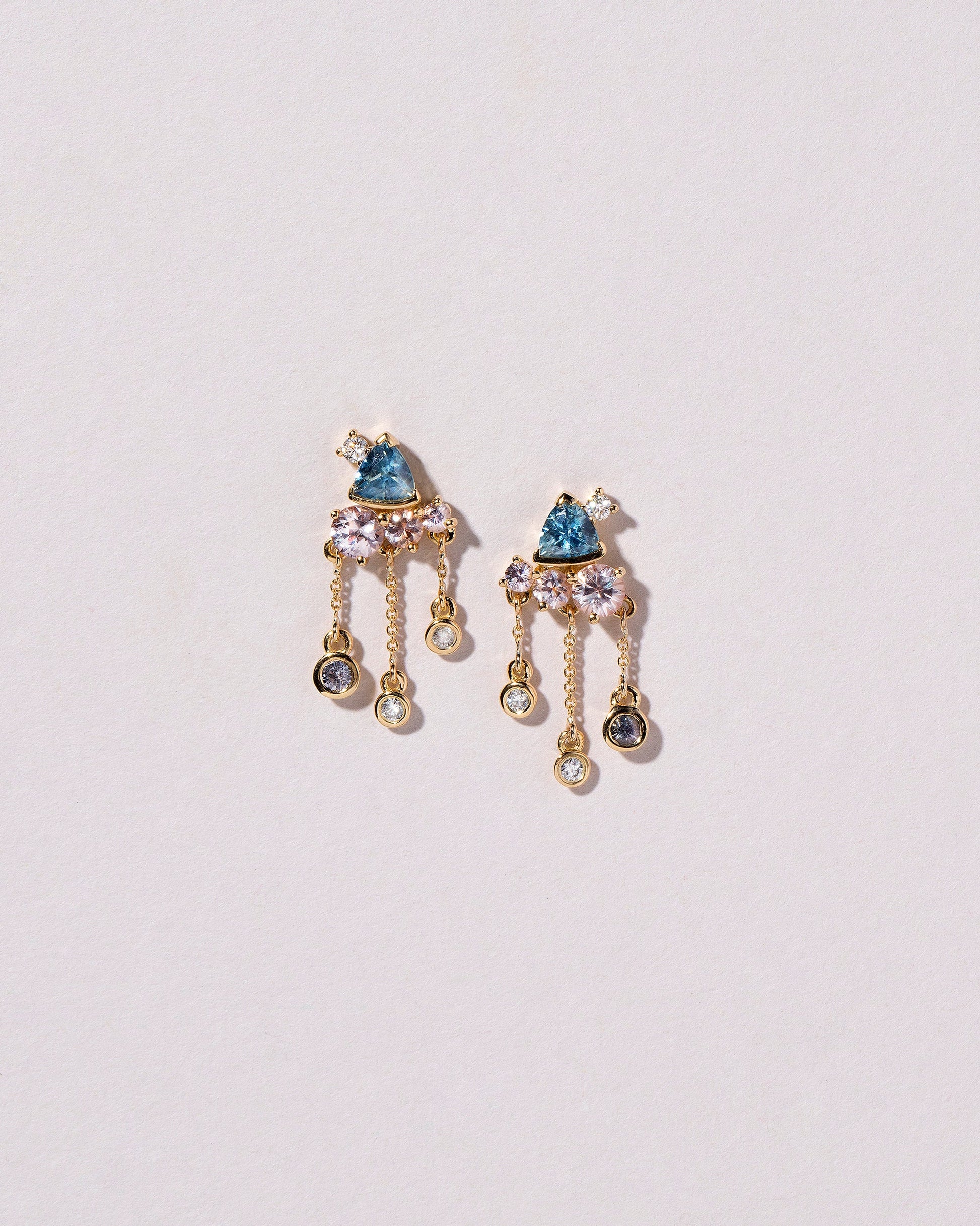  Persephone Earrings on light color background.