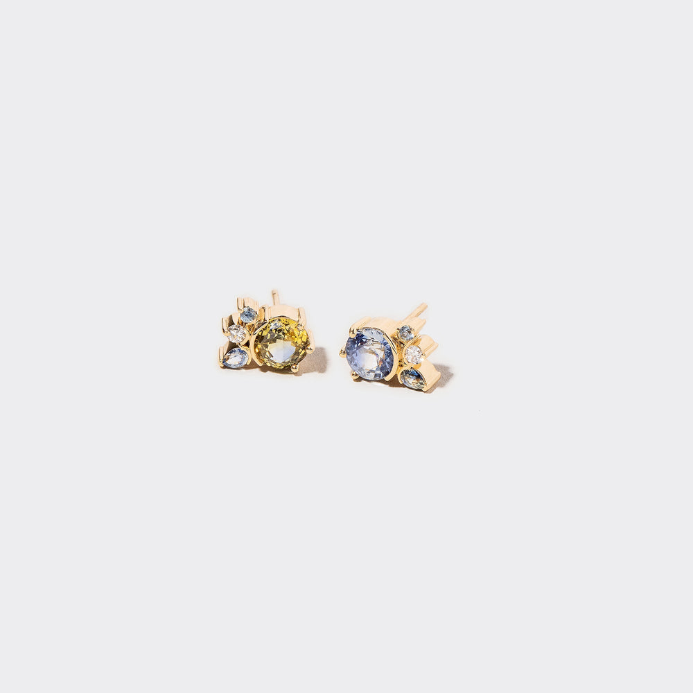 product_details:: Rotary Earrings on light color background.