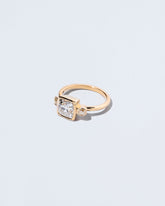  Genesis Ring on light color background.