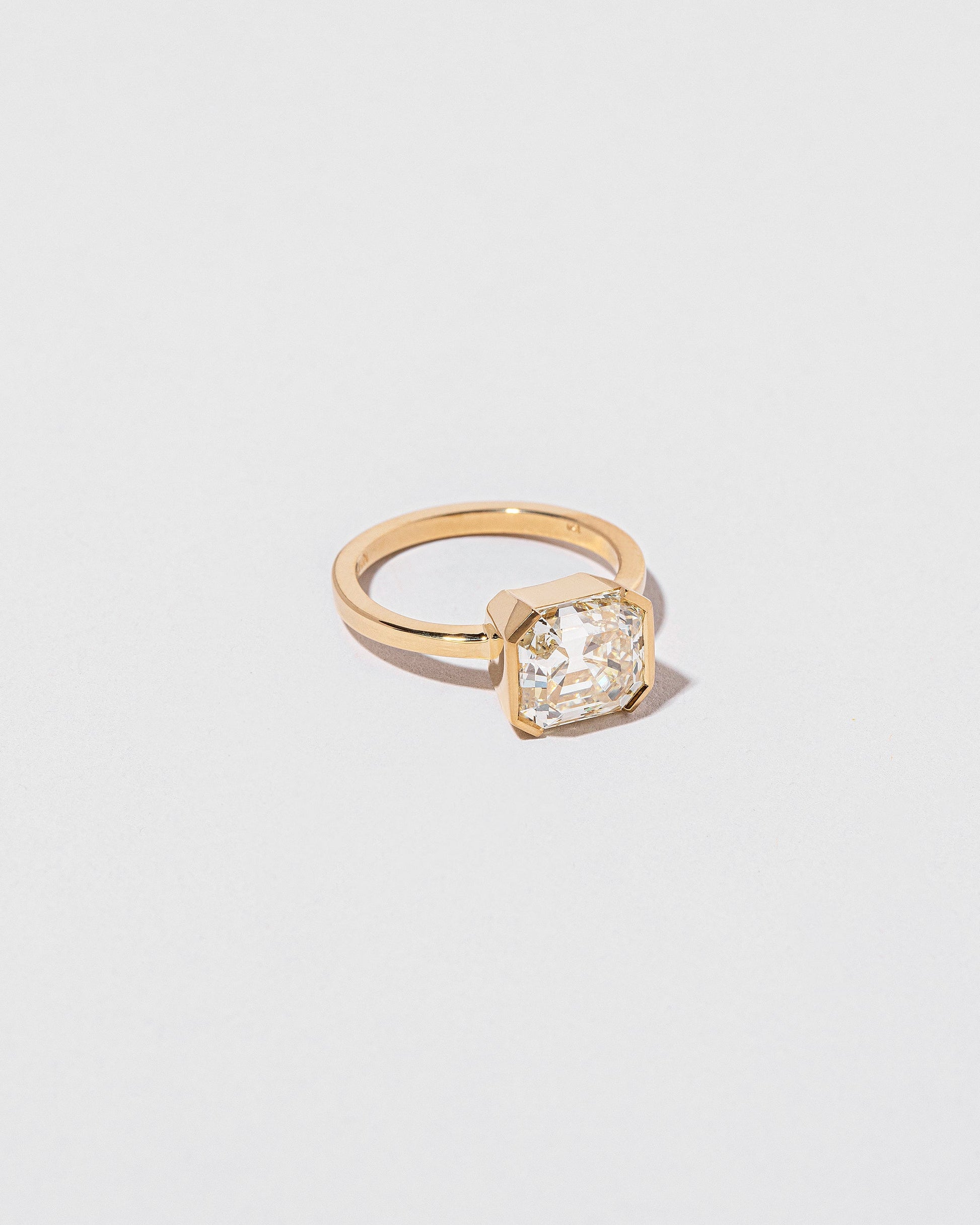 View from the side of the Future Past Ring on light color background.