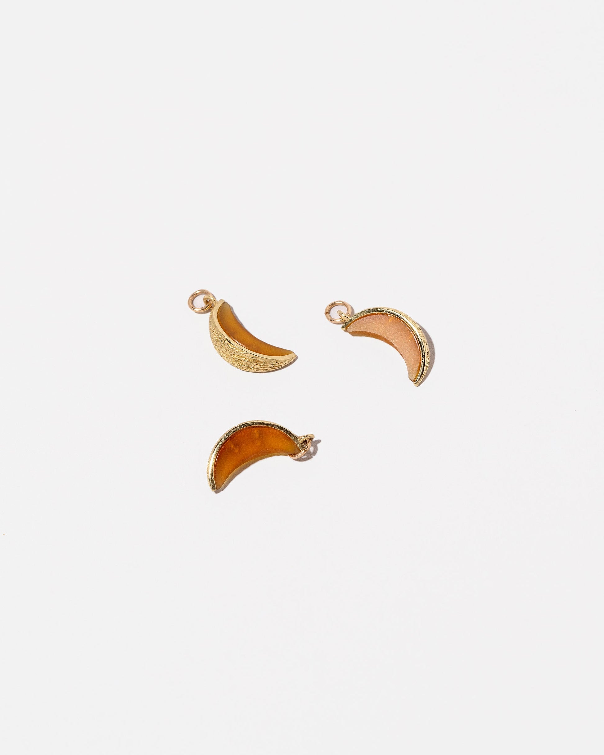  Sliced Fruit Charms - Melon on light color background.