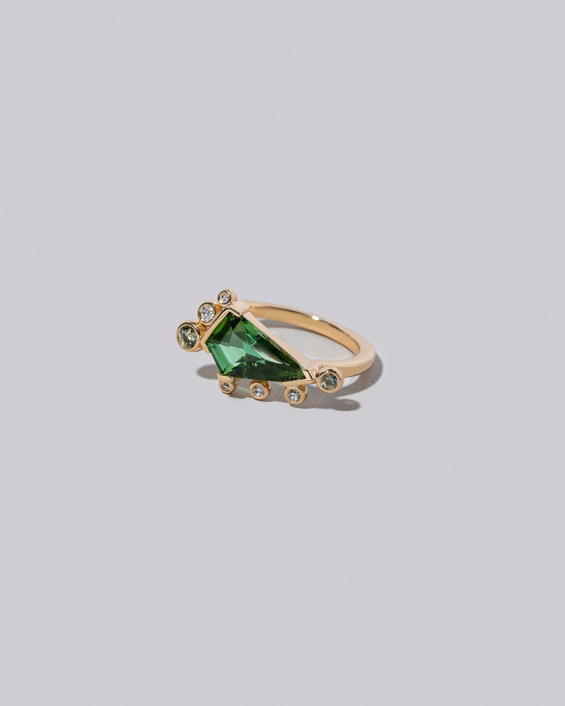  Faith Healer Ring on light color background.