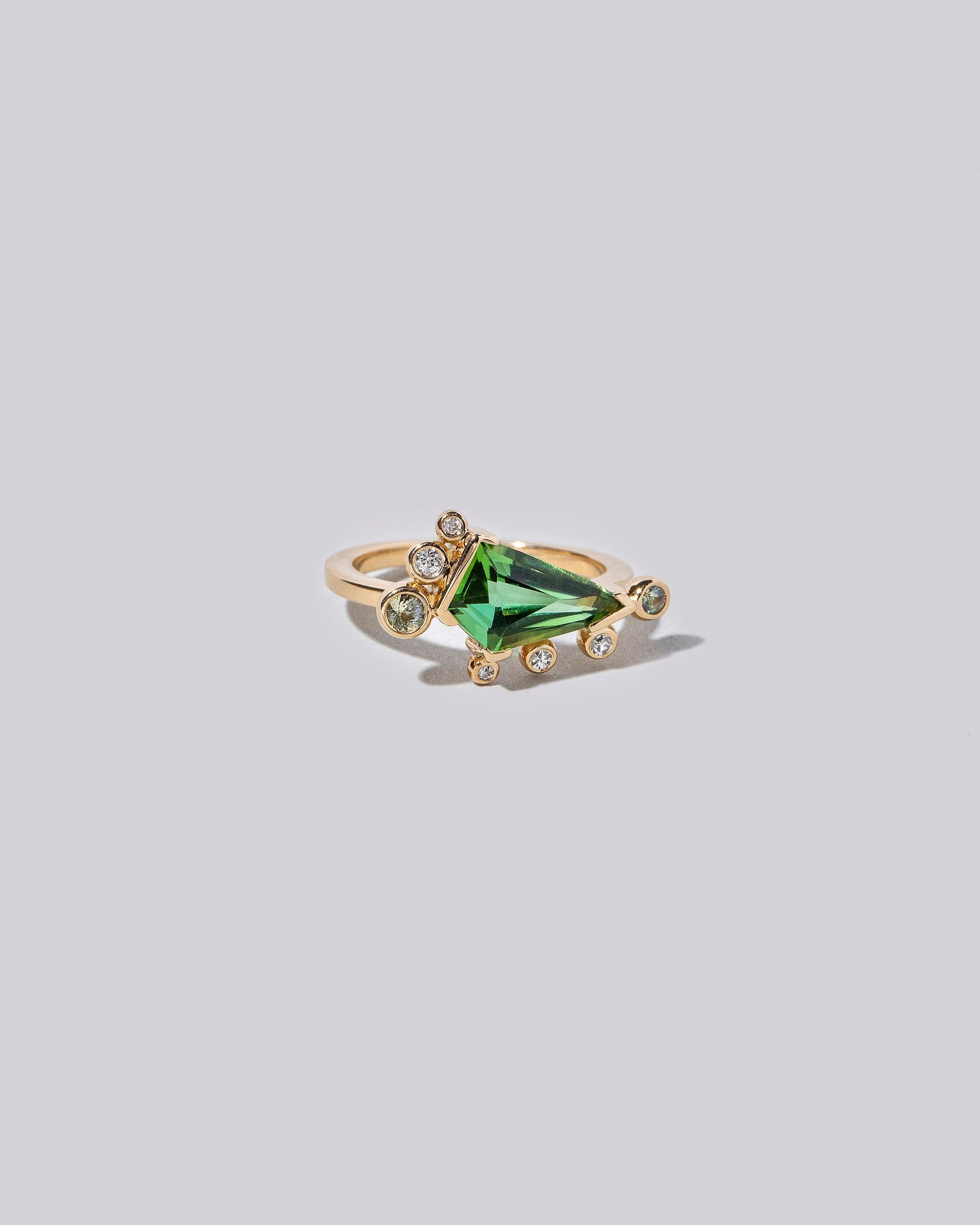  Faith Healer Ring on light color background.