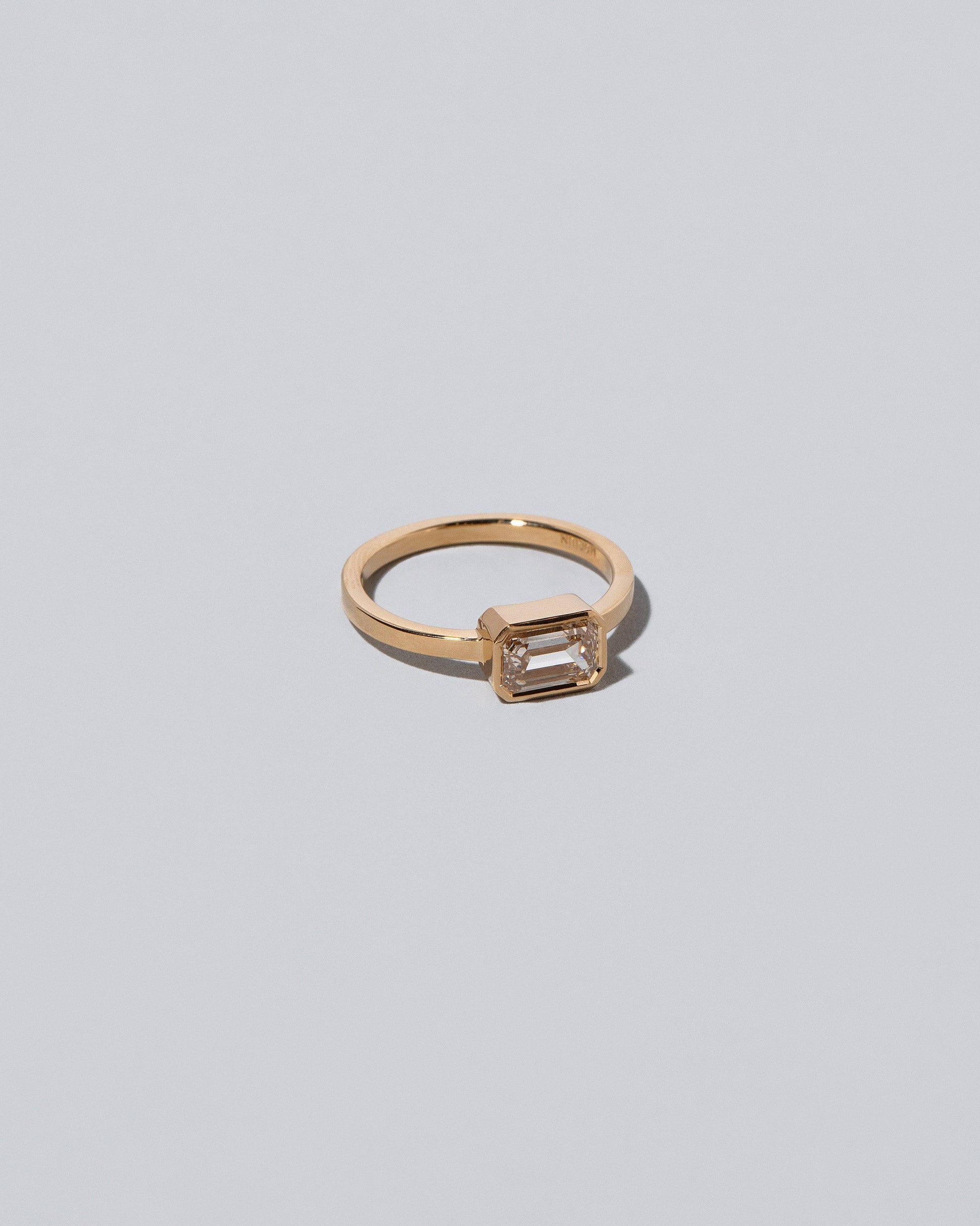 View from the side of the Spectrum Ring on light color background.