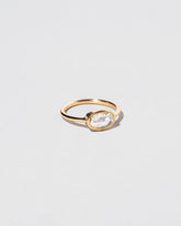 View from the side of the Moly Ring on light color background.