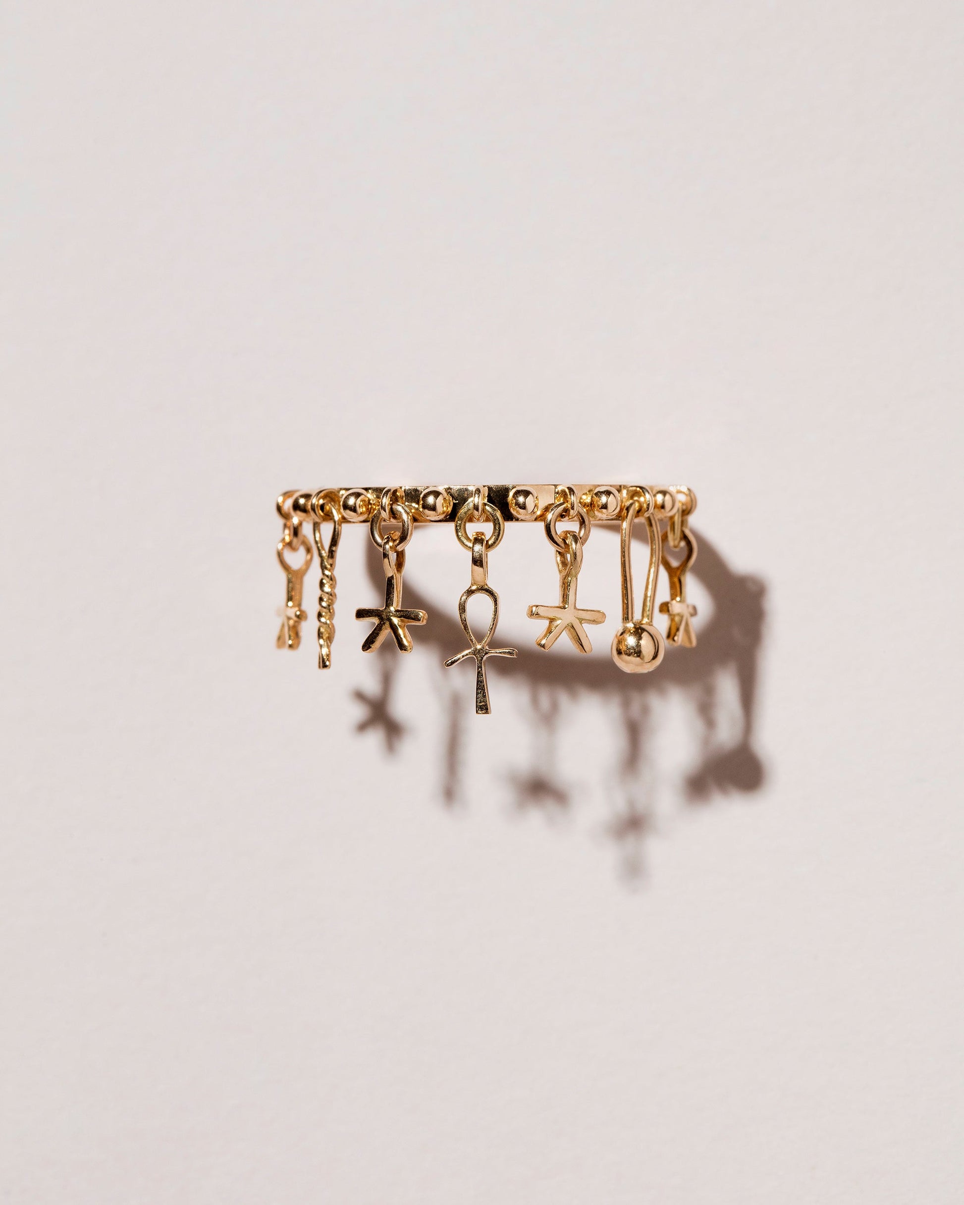  Talisman Ring on light color background.
