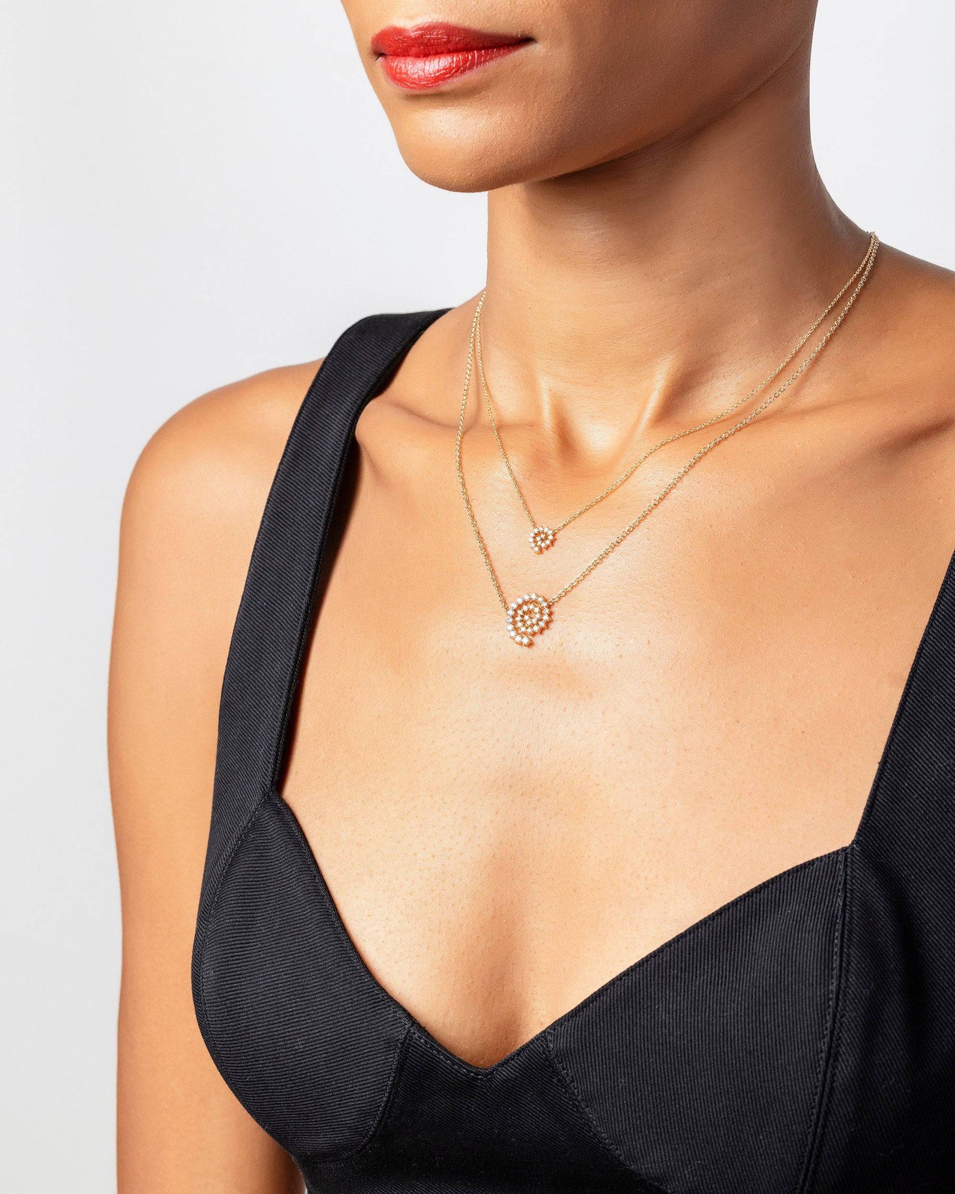 Mini and Full White Diamond Spiral Necklaces on model.