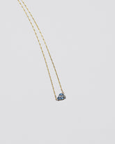  Say Yes Necklace on light color background.