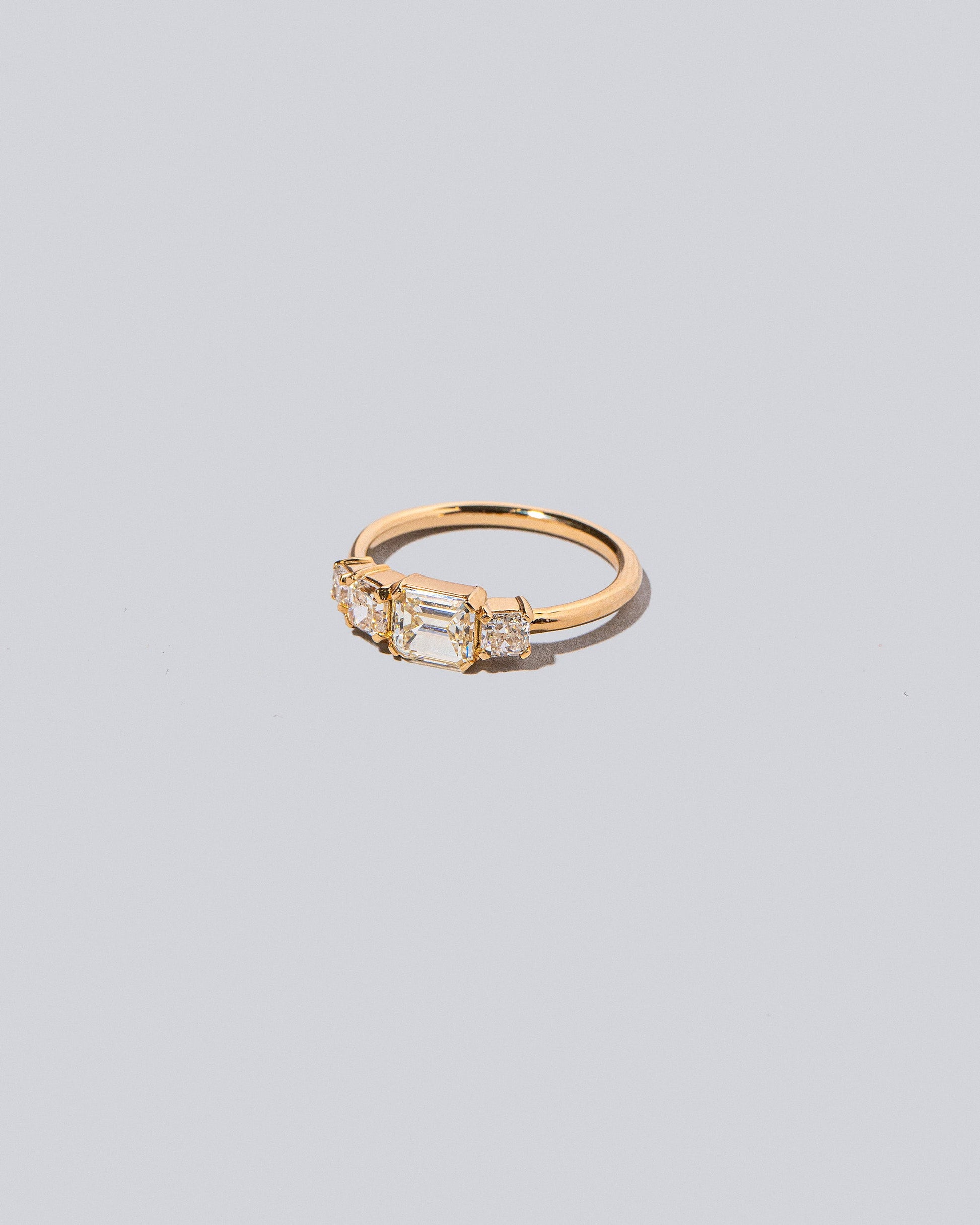 Product photo of the Lyric Ring on light light color background.