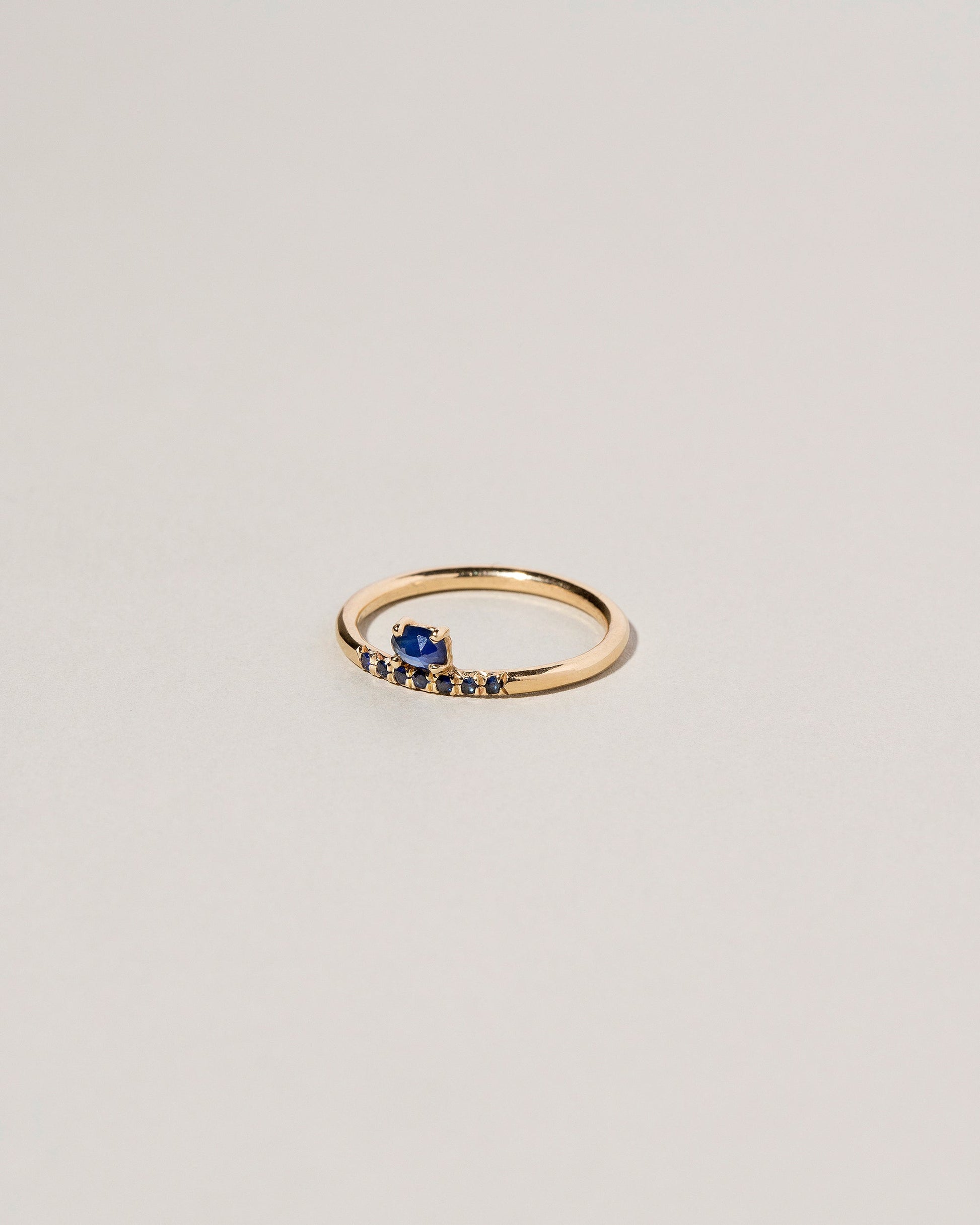  Stacked Ring - Sapphire & Black Diamond on light color background.