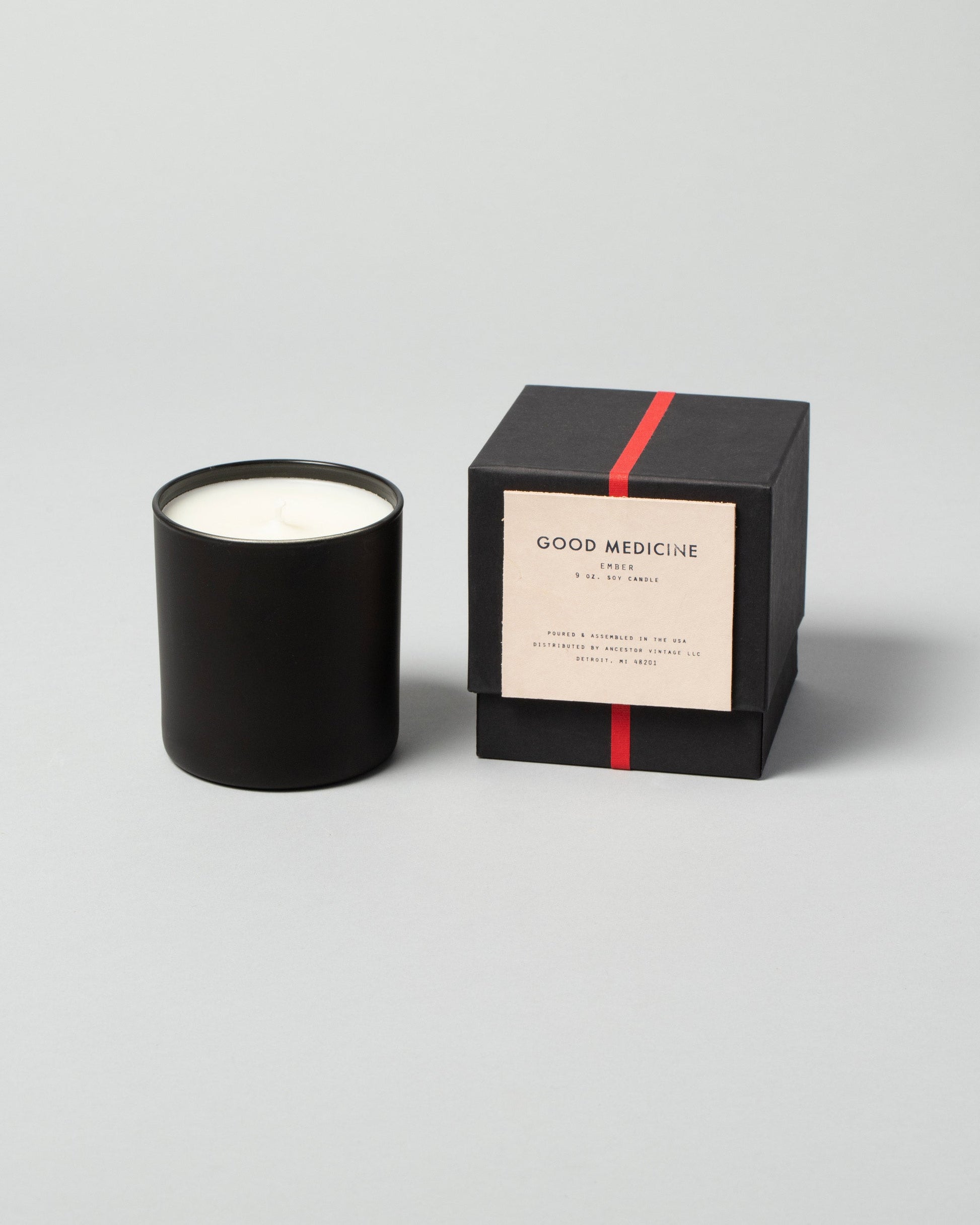Good Medicine Candle on light color background.