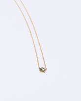 Closeup details of the Sagan Necklace on light color background.