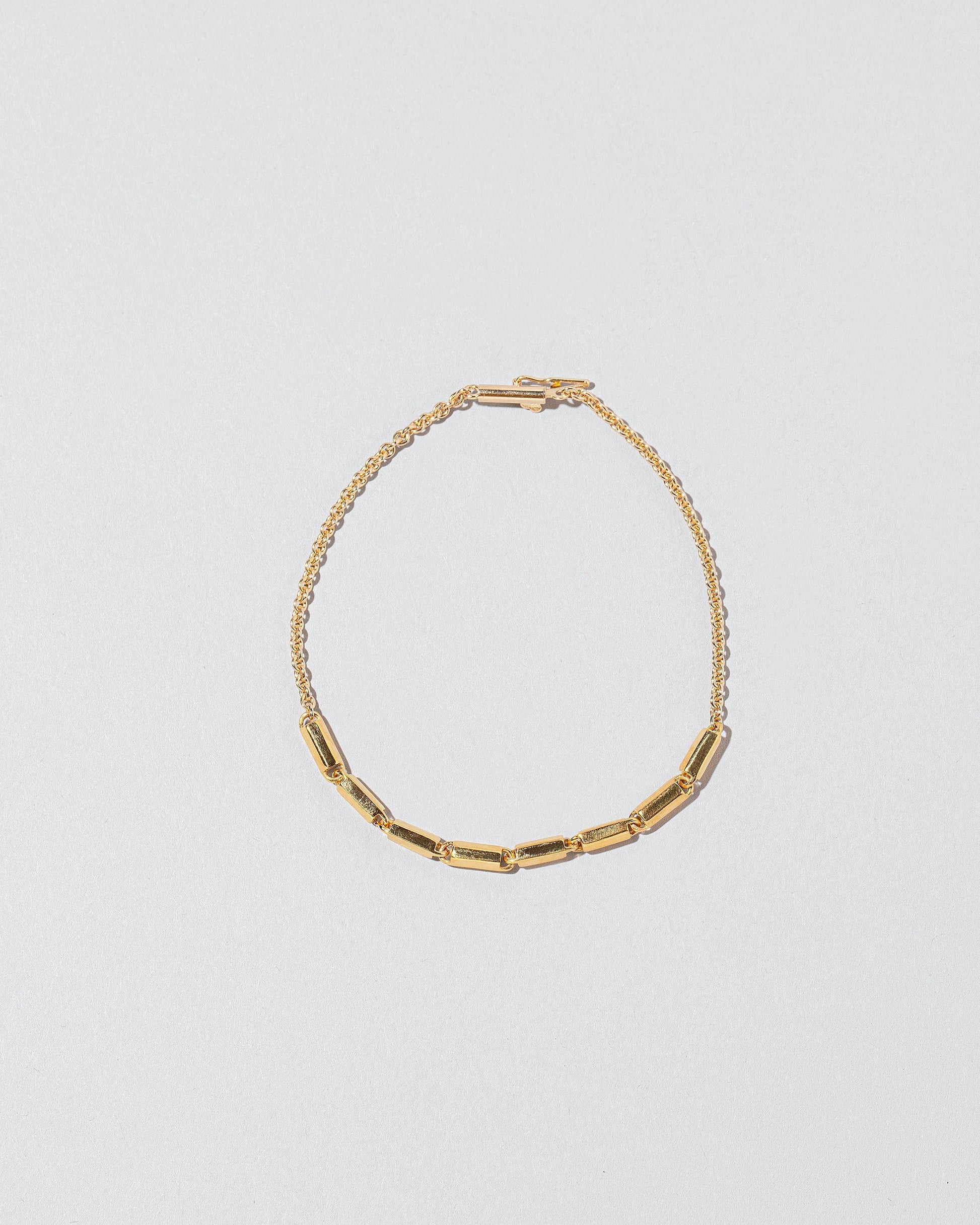  Inclusion Bracelet on light color background.