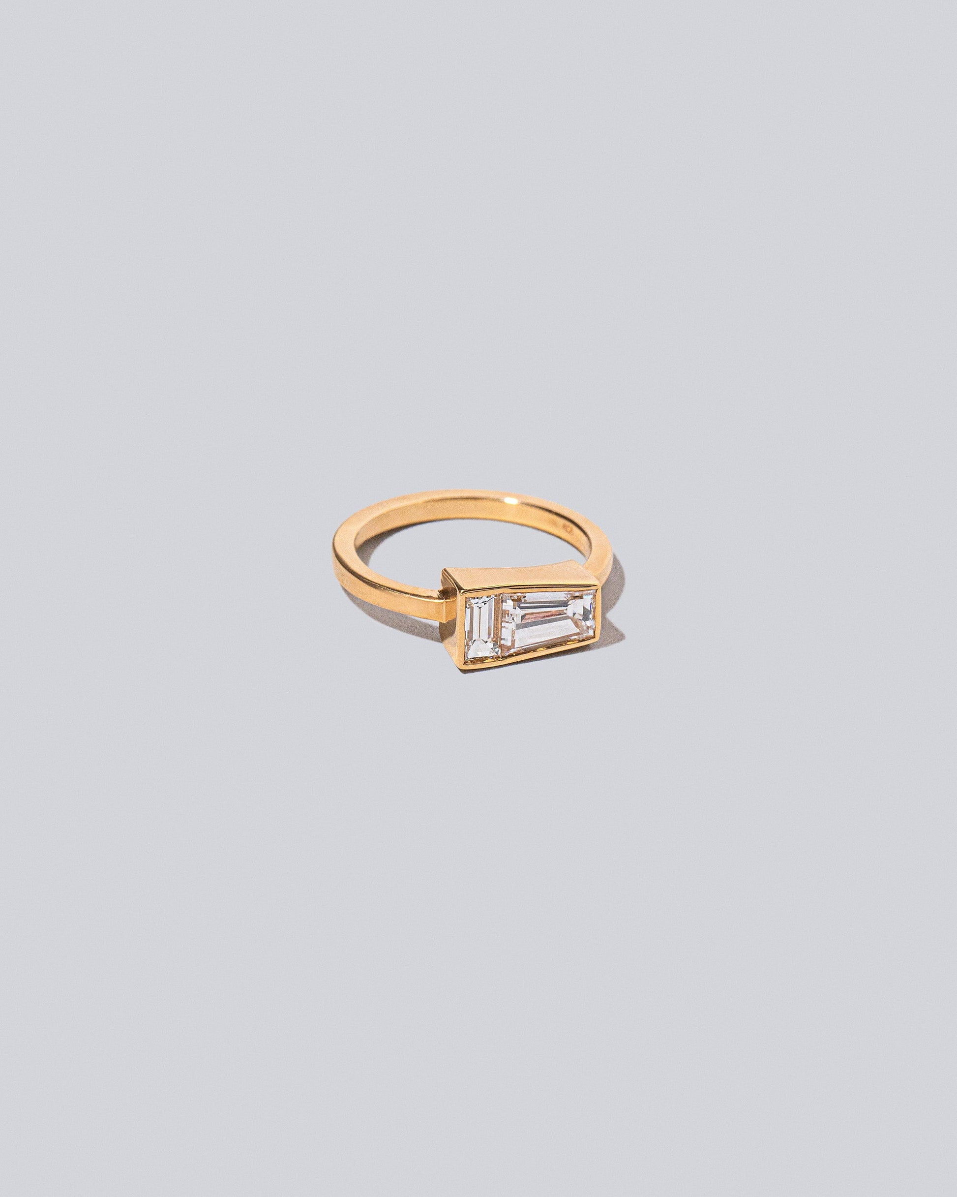 View from the side of the Ode Ring on light color background.