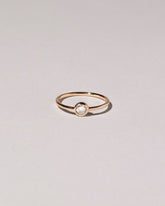 Rose Cut Purple Diamond Ring on light color background.