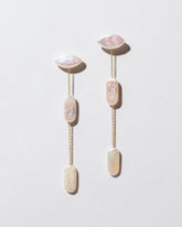 Candy Bar Pearl Drop Earrings on light color background.