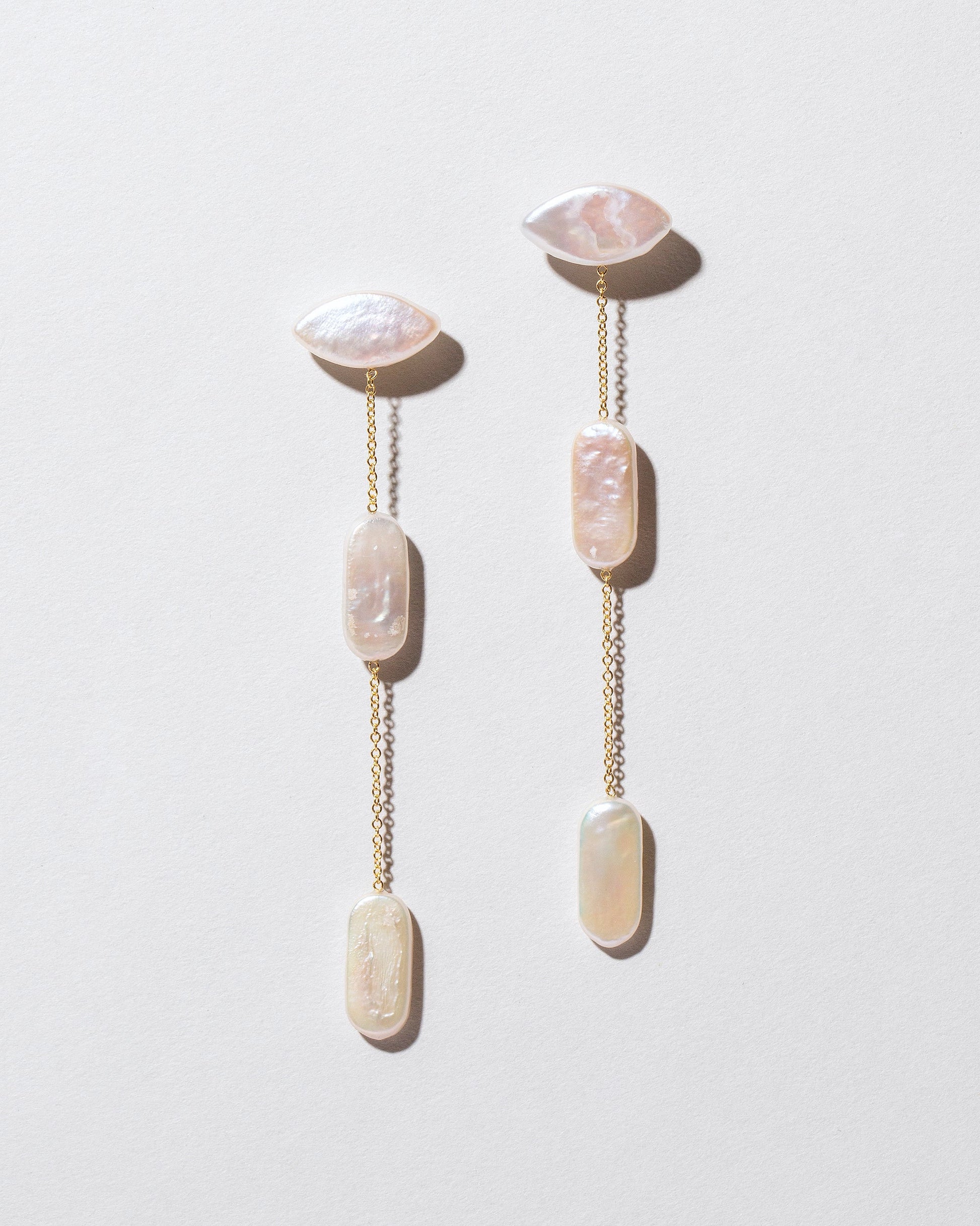Candy Bar Pearl Drop Earrings on light color background.