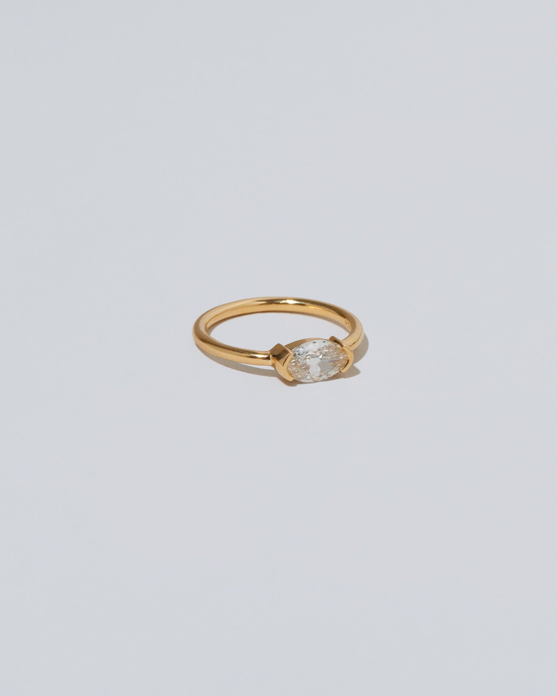 View from the side of the De Coté Ring on light color background.