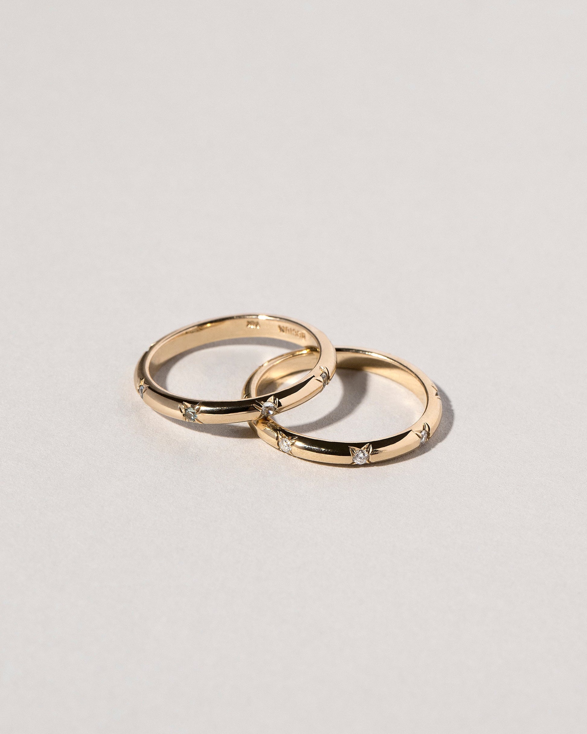 White Diamond Half Round Studded Bands on light color background.