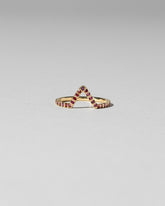 Red Anthill Garnet Pavé Triangle Band on light color background.
