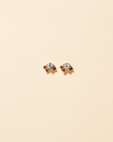  Aquamarine & Garnet Earrings on light color background.