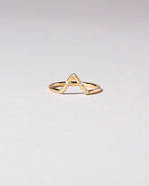 Gold White Diamond Five Stone Triangle Band on light color background.