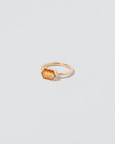 View from the side of the Dawnstar Ring on light color background.