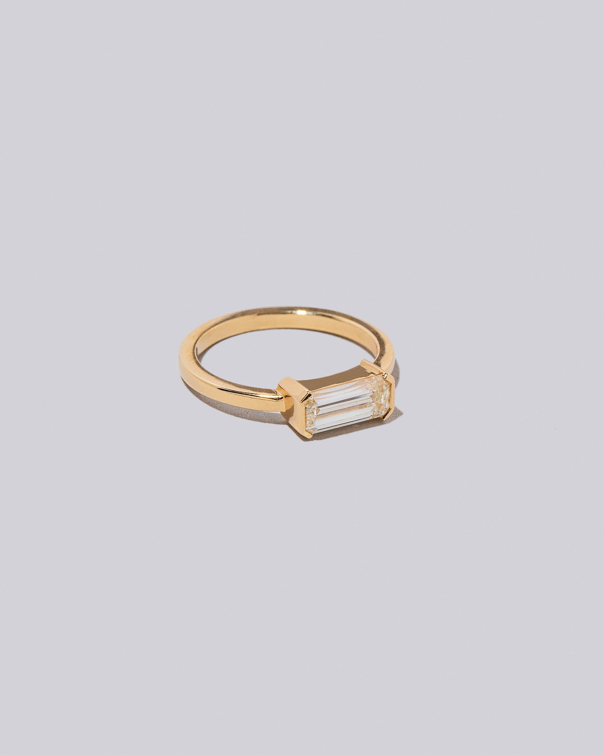 View from the side of the Vibrato Ring on light color background.