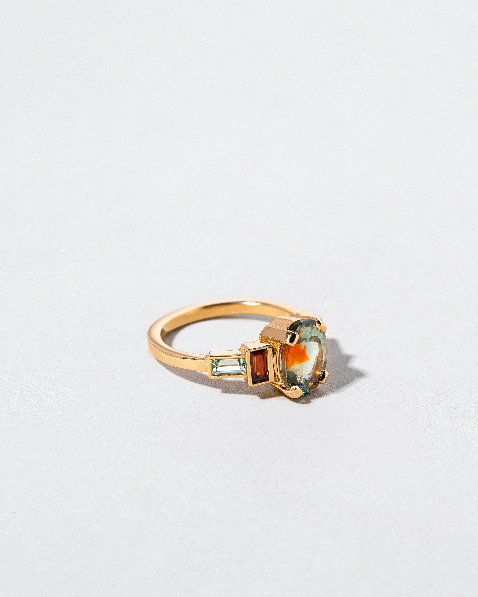  Acton Ring on light color background.