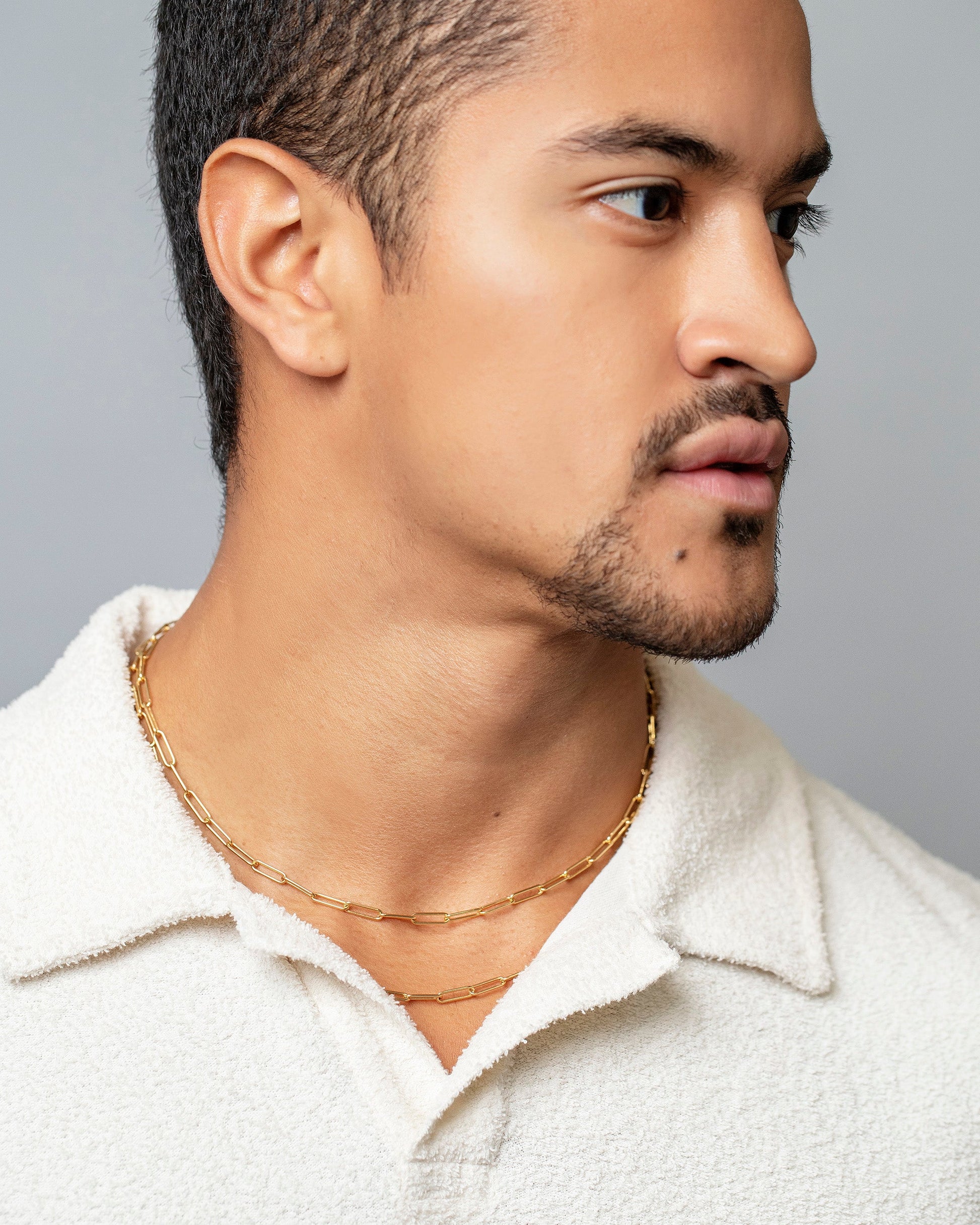 Long Oval Chain Necklaces on male model.