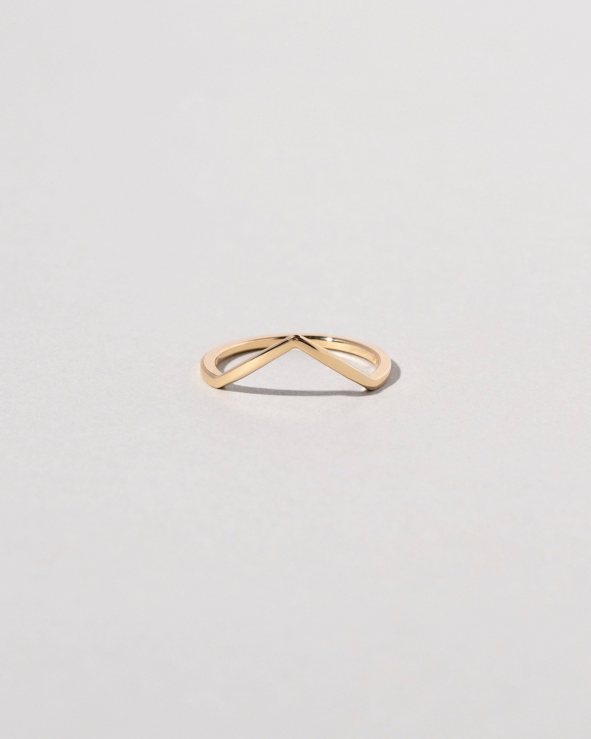 Gold Solid Square Wire High Peak Band on light color background.