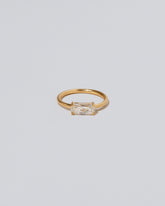 Adage Ring on light color background.