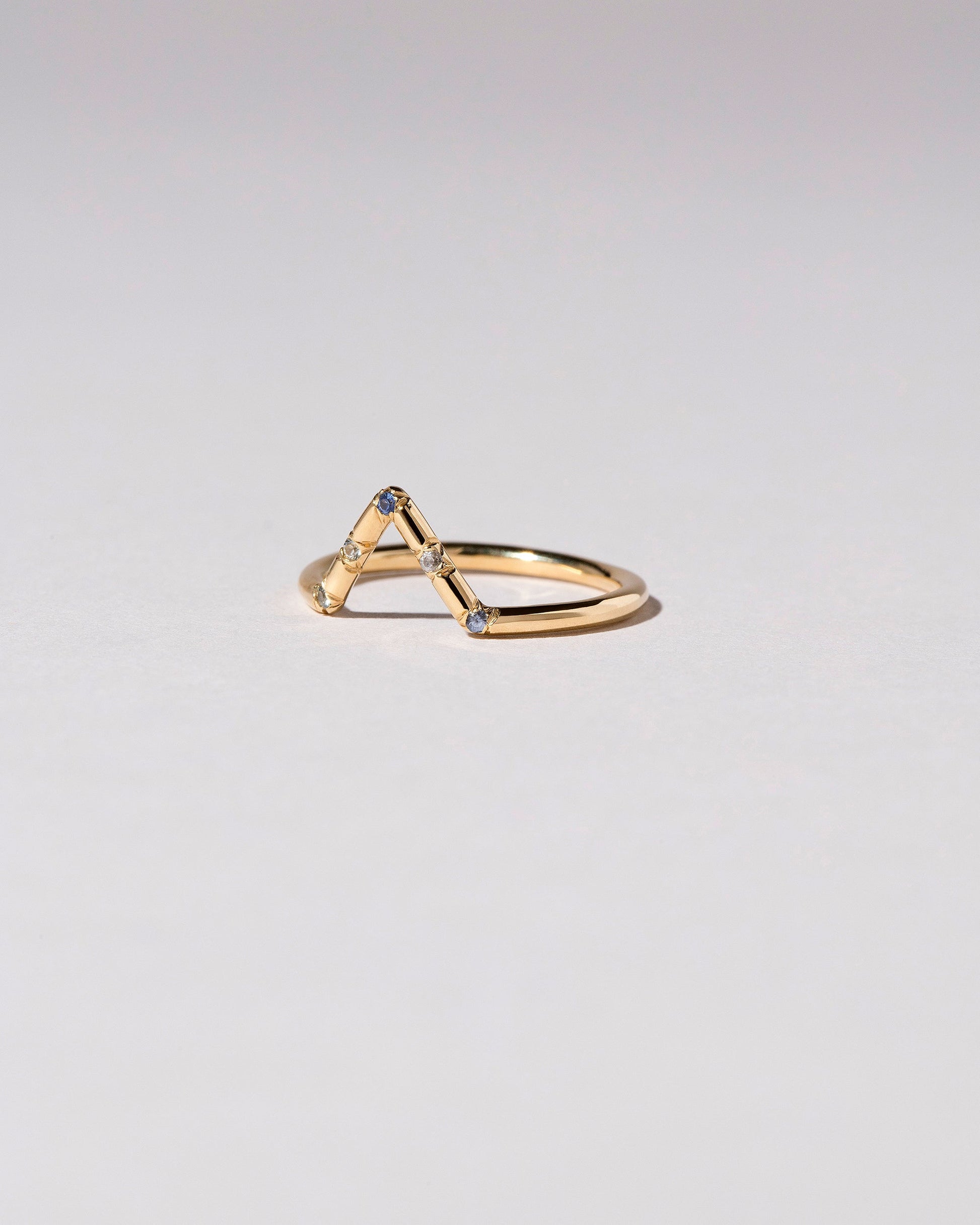  Triangle Band - Five Stone on light color background.