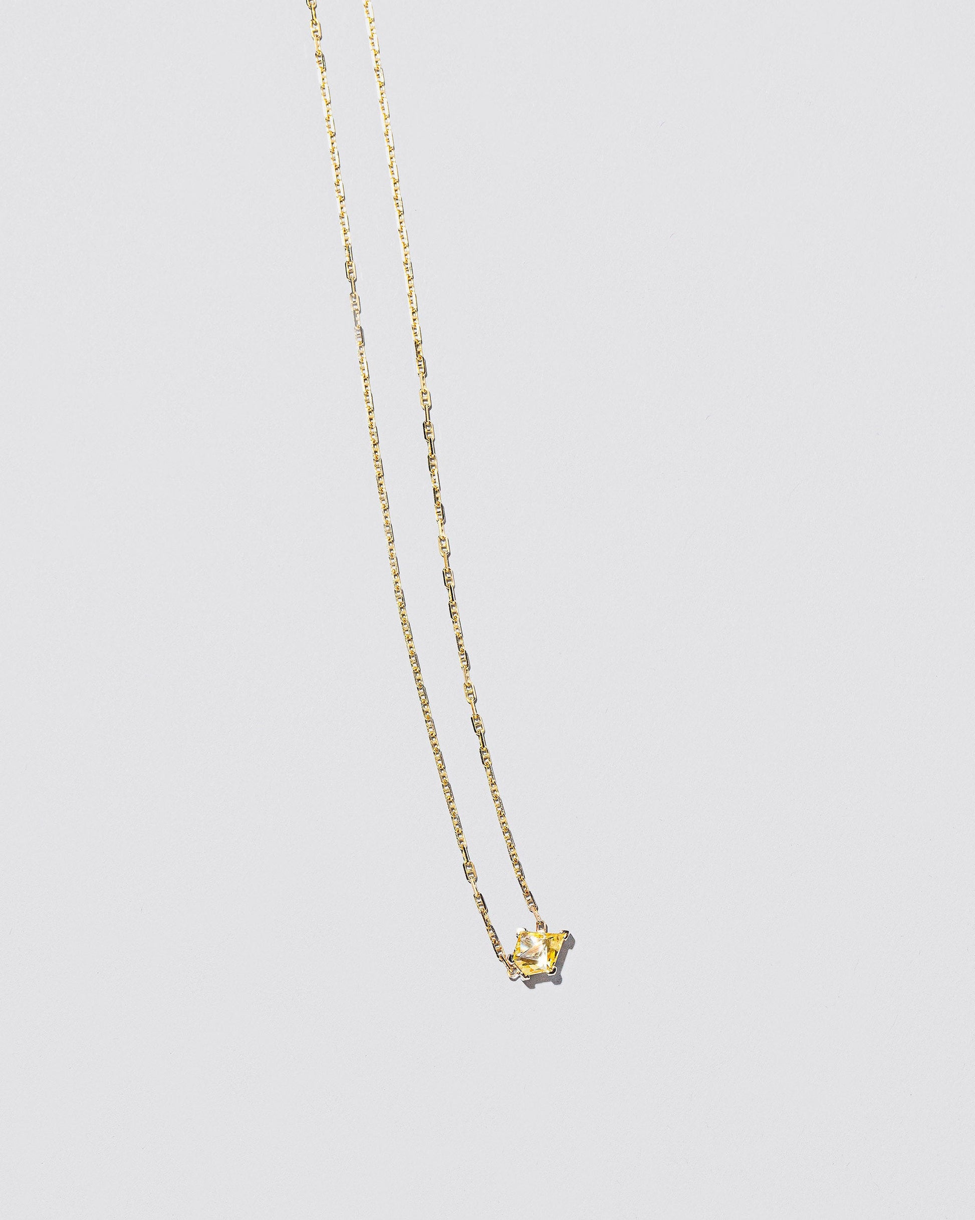  Be Good Necklace on light color background.