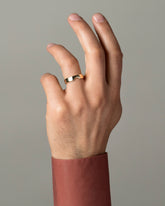 Gold 4mm Half Moon Notch Band on male model.