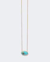 Tranquility Necklace on light color background.