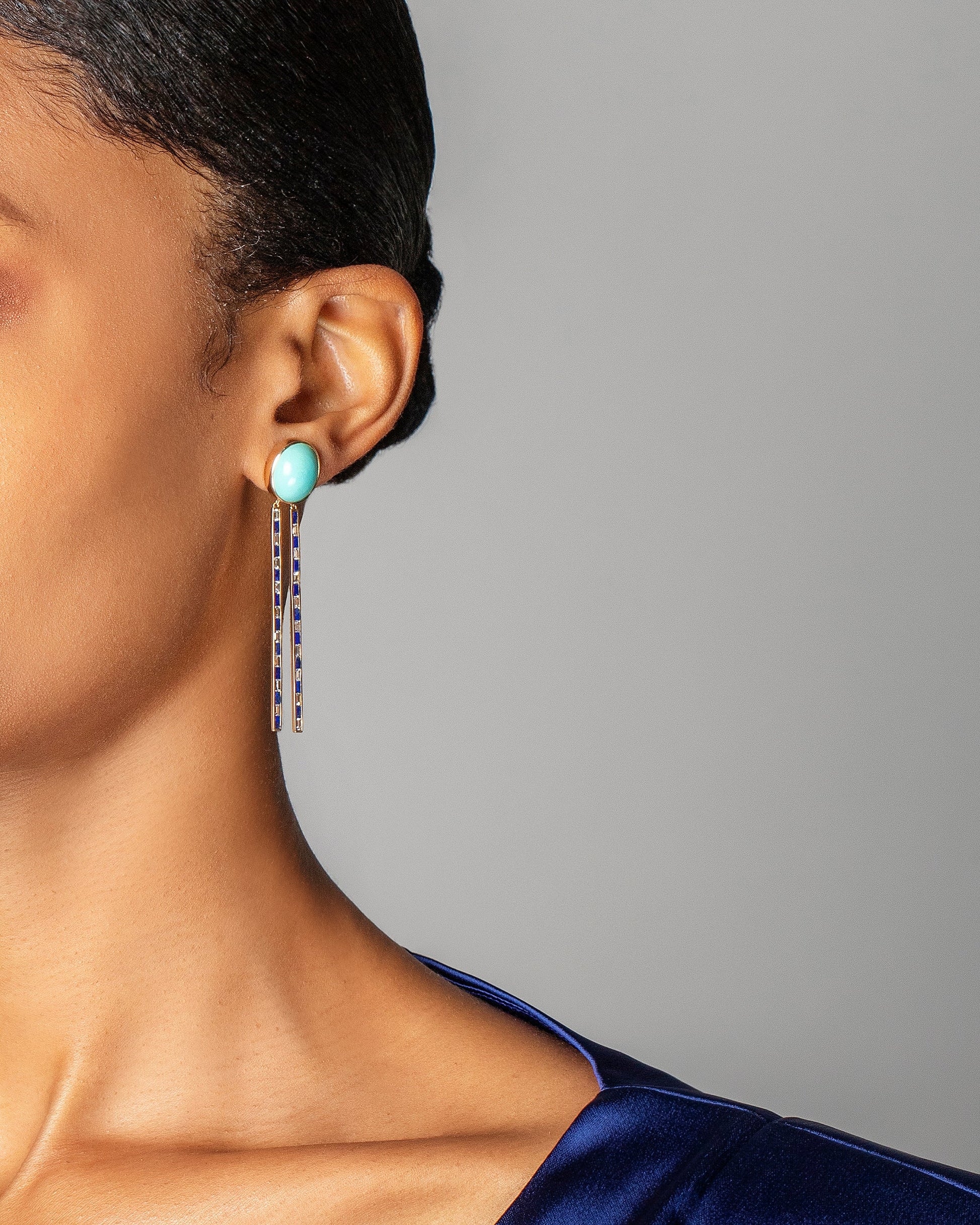 Spiritual Transformation Earrings on model.