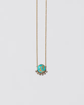 Life-Giver Necklace on light color background.
