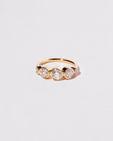 Lyra Ring on light color background.