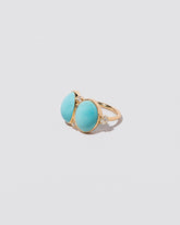 In-Between Ring on light color background.