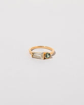 Merret Ring on light color background.