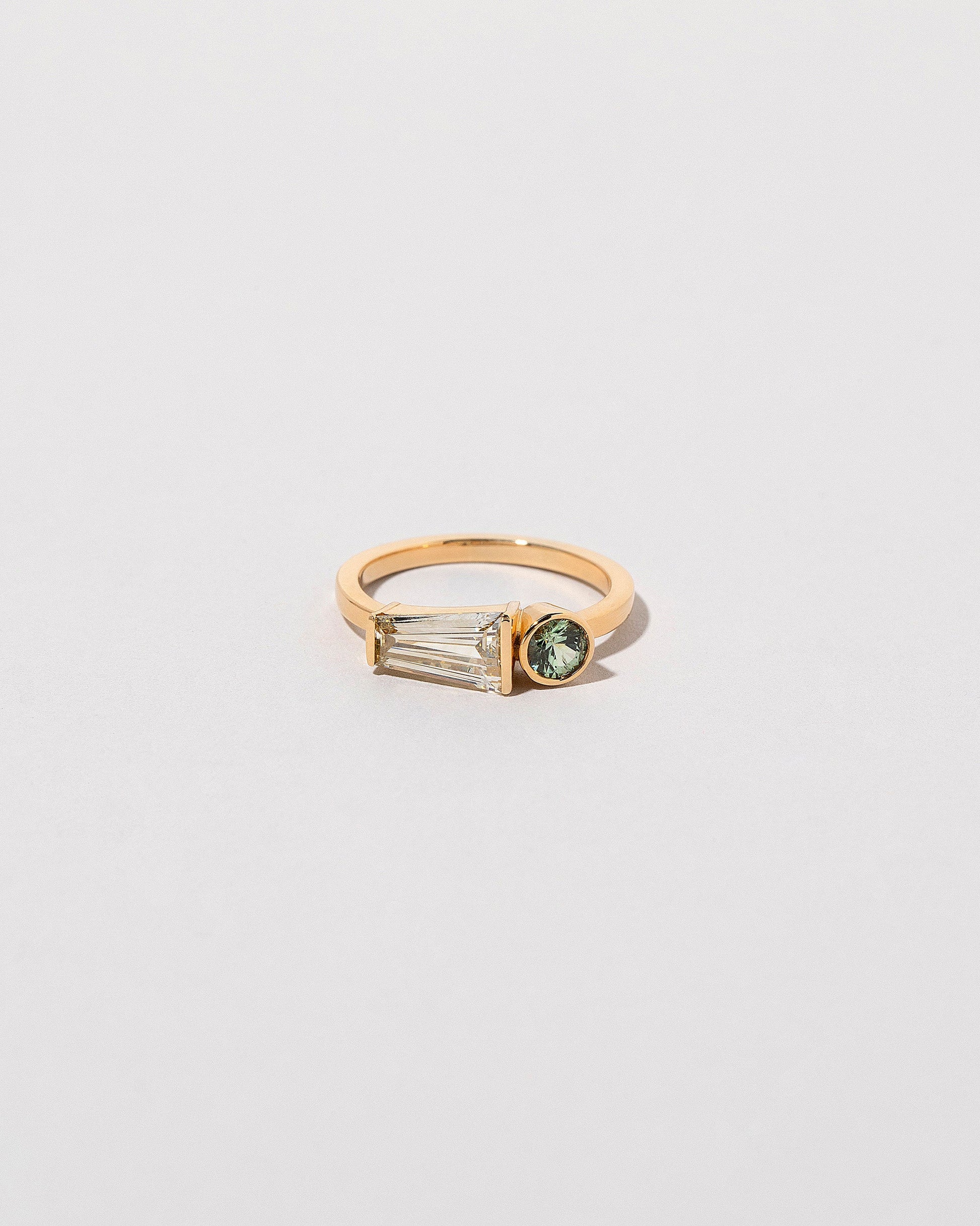  Merret Ring on light color background.