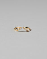 Gold White Diamond Pavé High Peak Band on light color background.